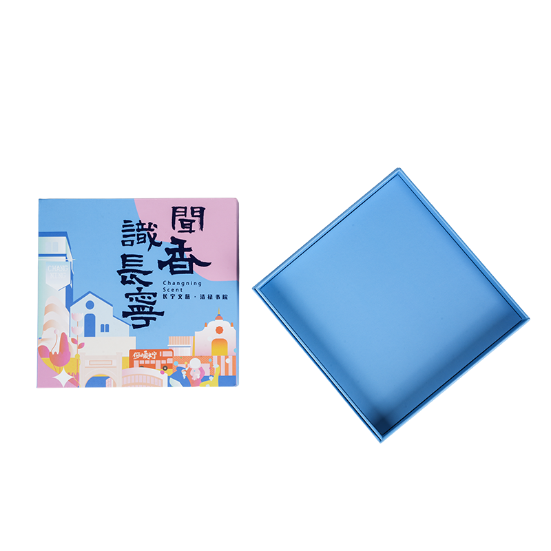 Caja de música giratoria con forma de libro duro y temática navideña