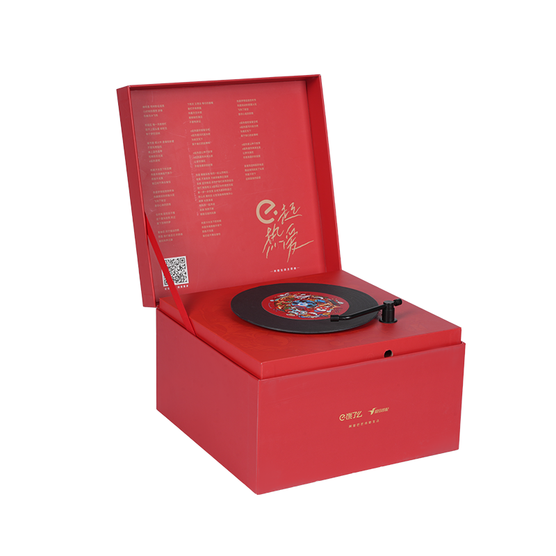 Caja de música giratoria con forma de libro duro y temática navideña